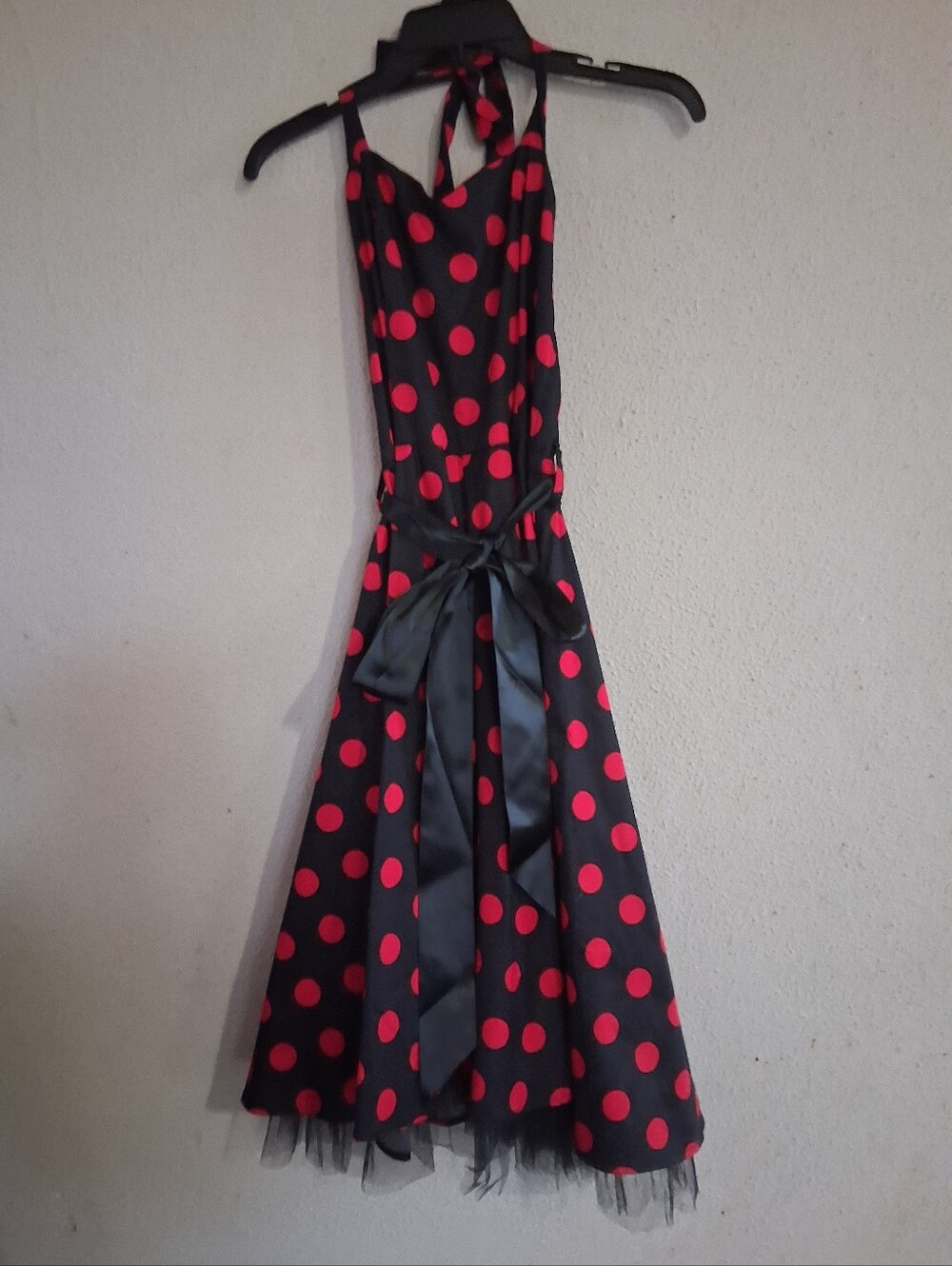 Hearts And Roses, made in the UK. Ladies Black Dress with Red Polka Dots and Bow